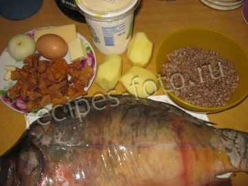 Карп фаршированный гречкой и грибами запеченный в духовке