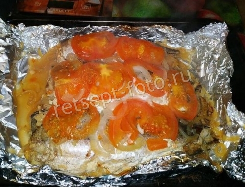 Хек с овощами в духовке